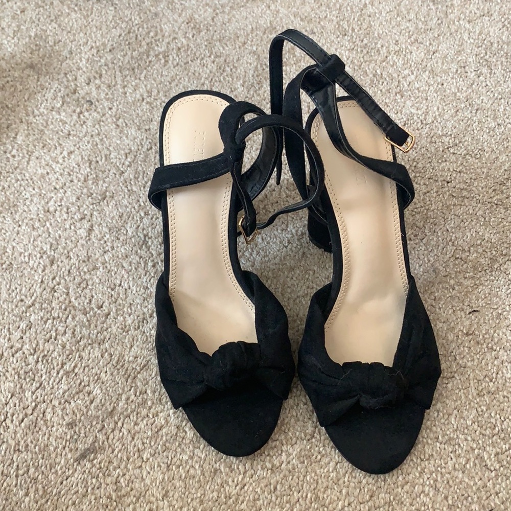 Black heeled sandals with ankle strap